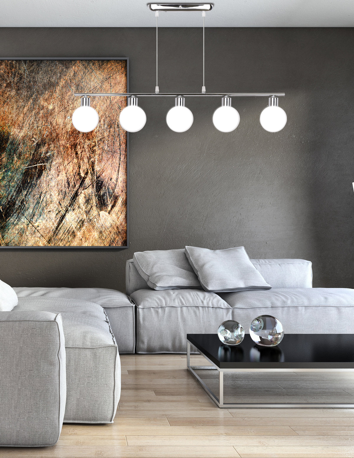 Mise en ambiance dans un salon moderne, canapé gris et grand tableau