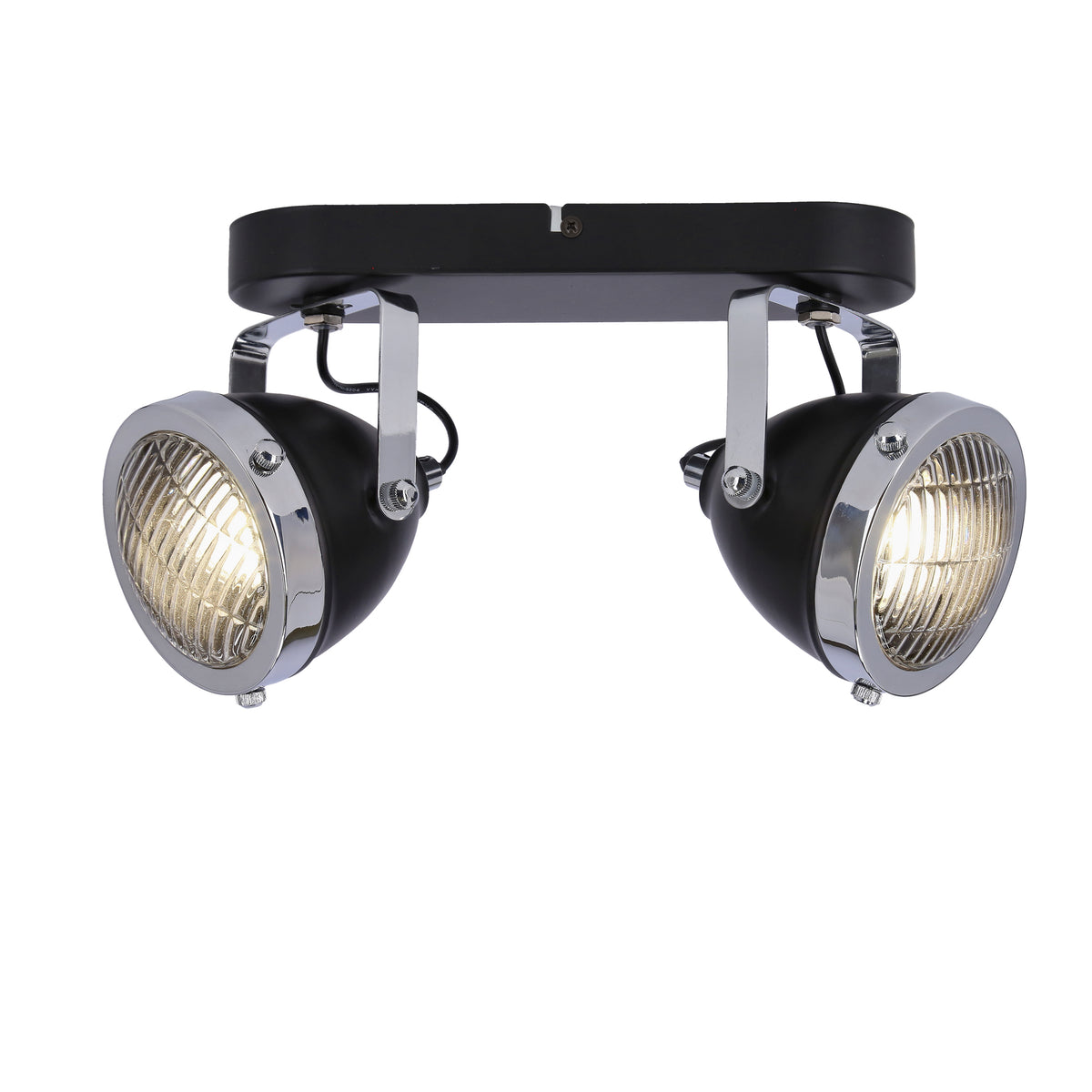 Spots allumés diffusant une lumière chaude à travers la grille métallique