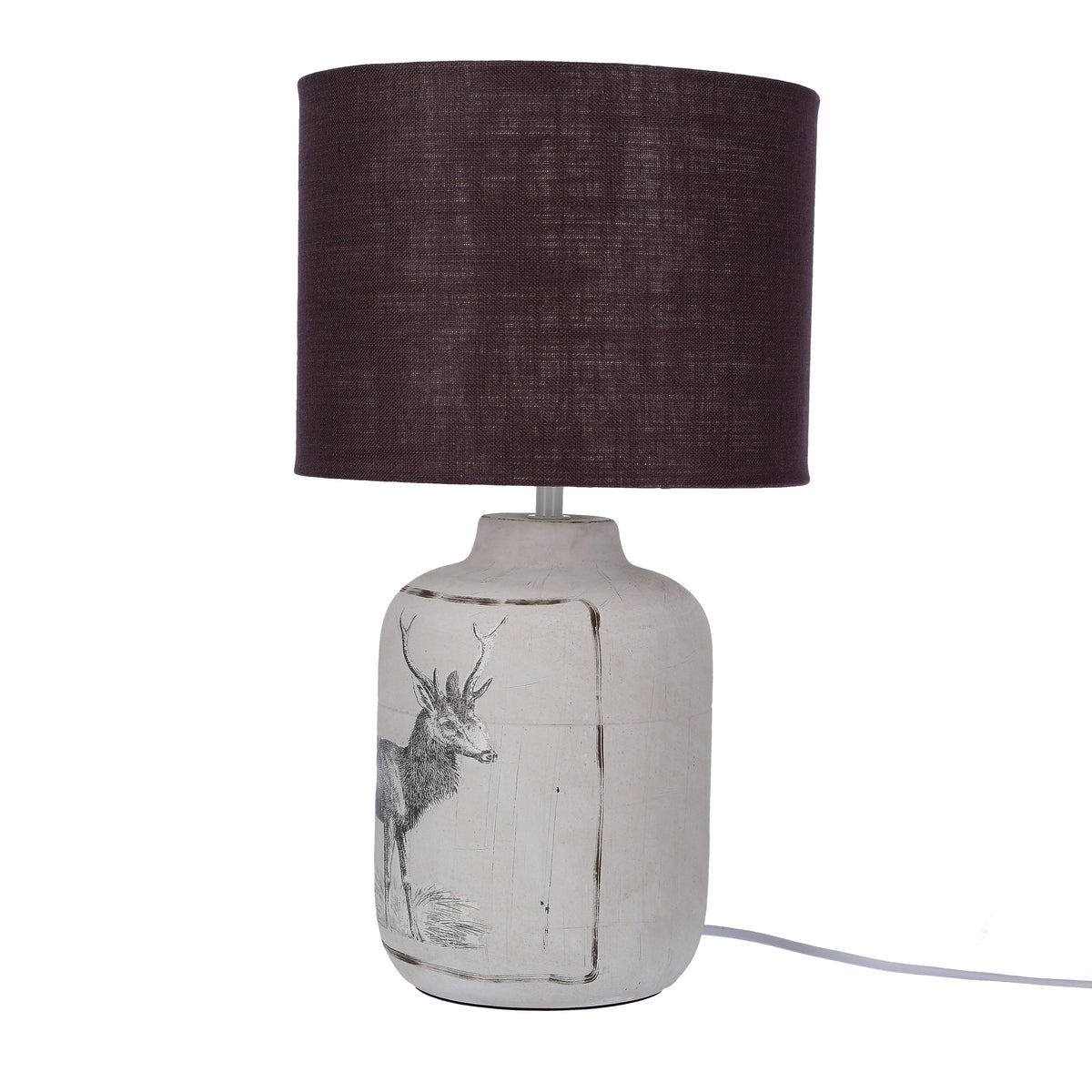 Lampe éteinte avec abat-jour marron foncé et base ornée d'un cerf gravé