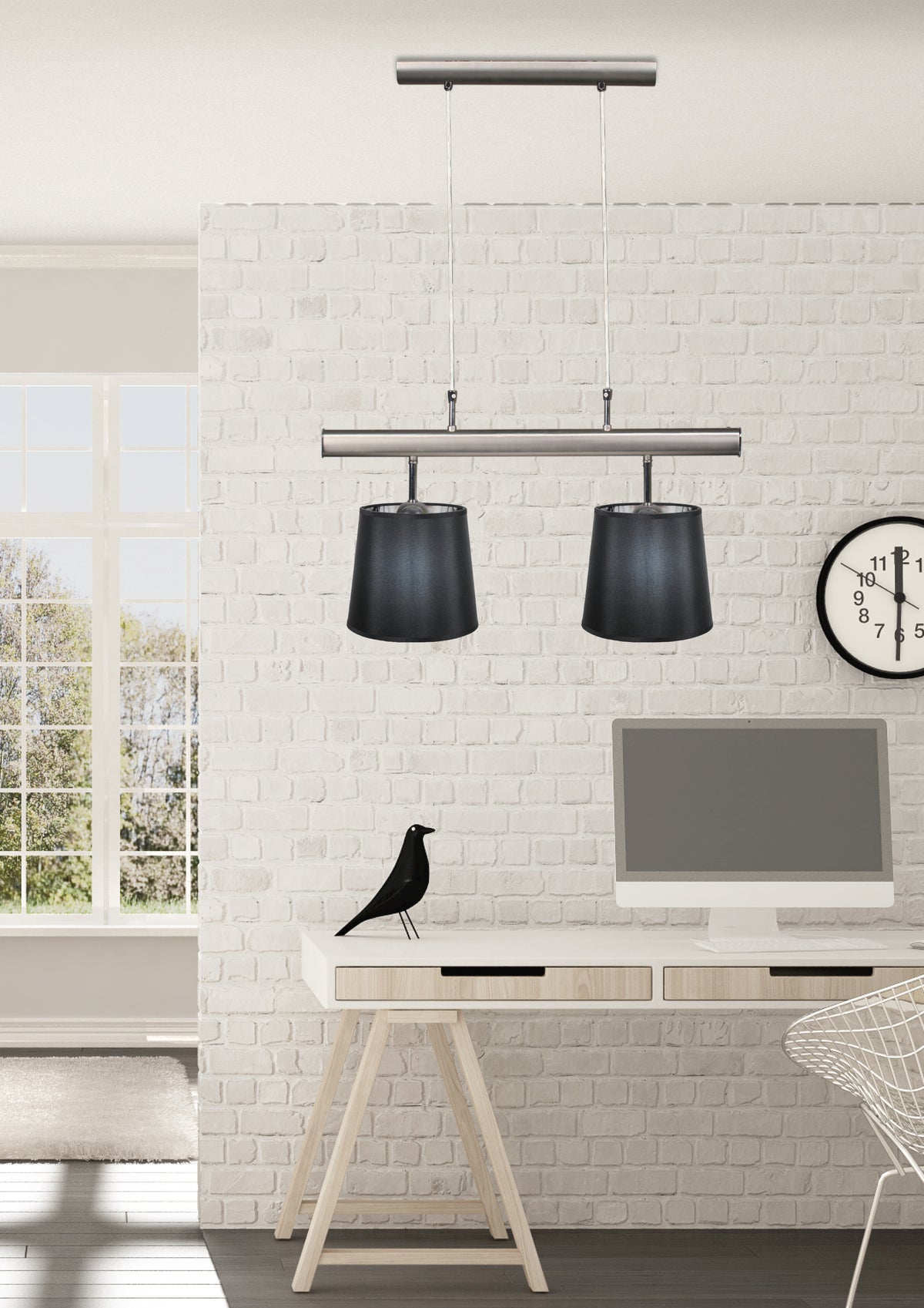 Mise en ambiance du luminaire suspendu au-dessus d'un bureau devant un mur de briques blanches