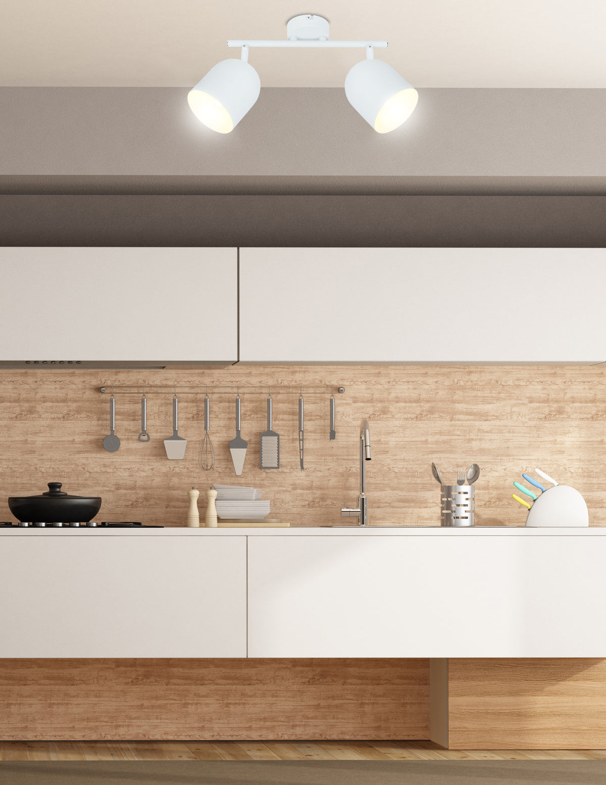 Plafonnier deux spots blancs éclairant le plan de travail d'une cuisine moderne
