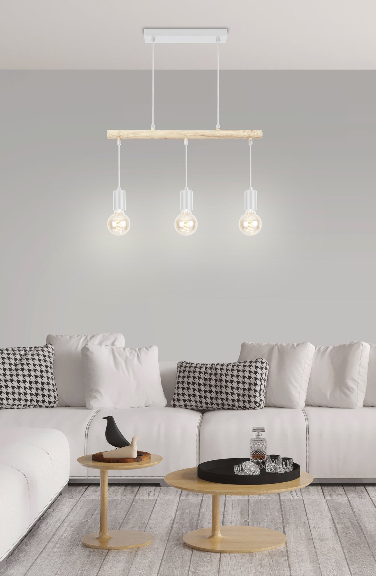 Mise en ambiance du luminaire blanc au-dessus d'un canapé dans un salon contemporain