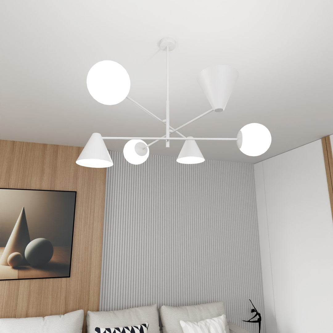 Vue en contre-plongée du lustre allumé au plafond d'un séjour moderne