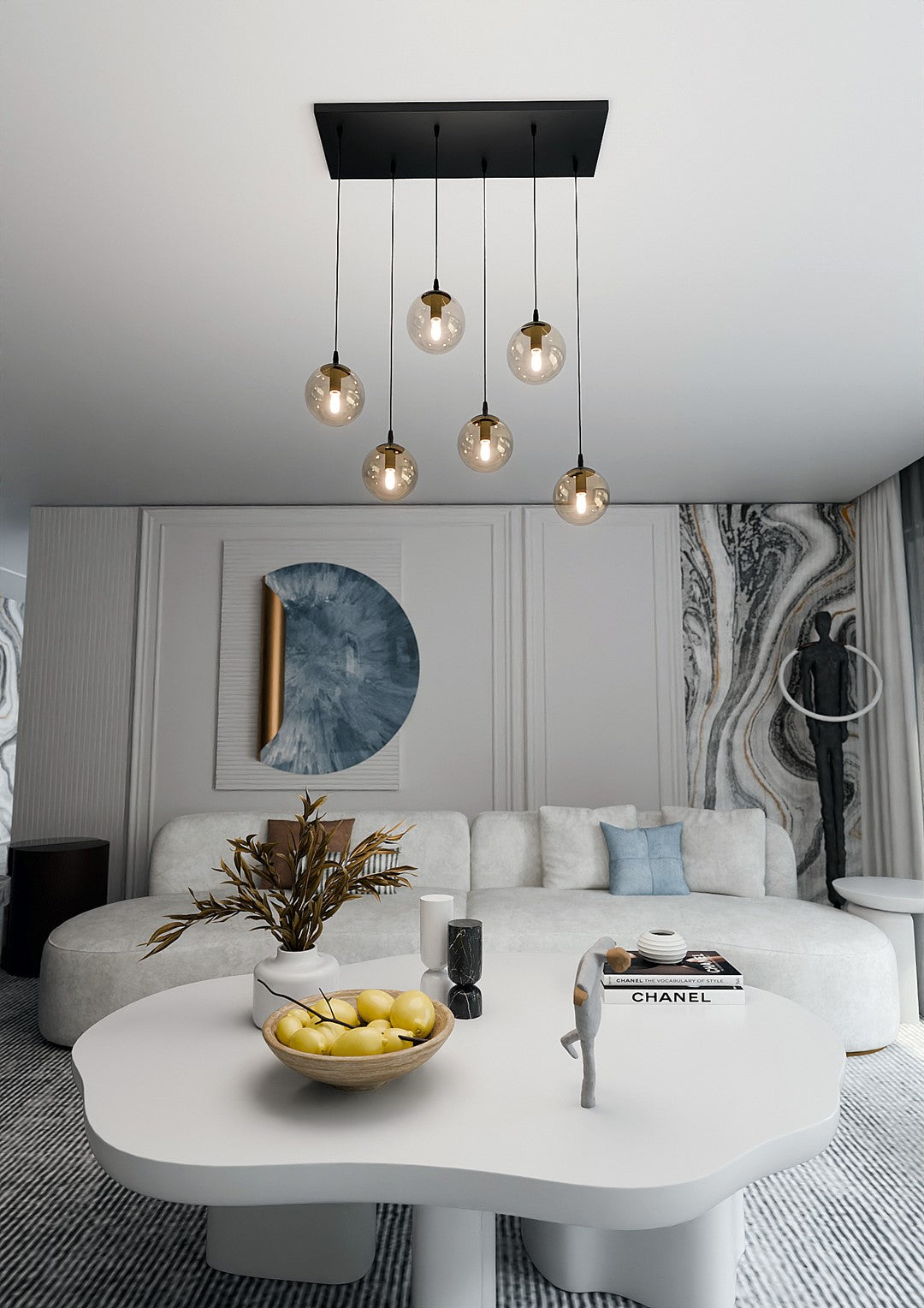 Mise en ambiance salon contemporain, luminaire allumé au-dessus d'une table basse blanche