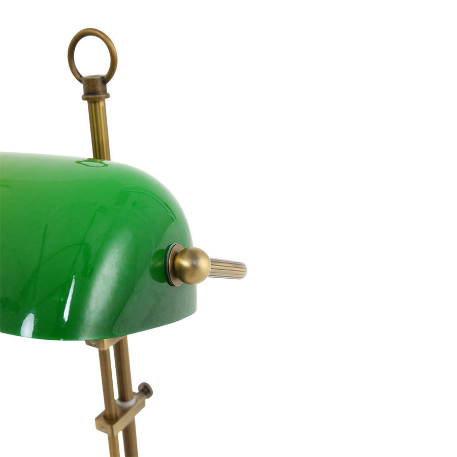 Détail du réflecteur vert et de la molette de fixation en laiton