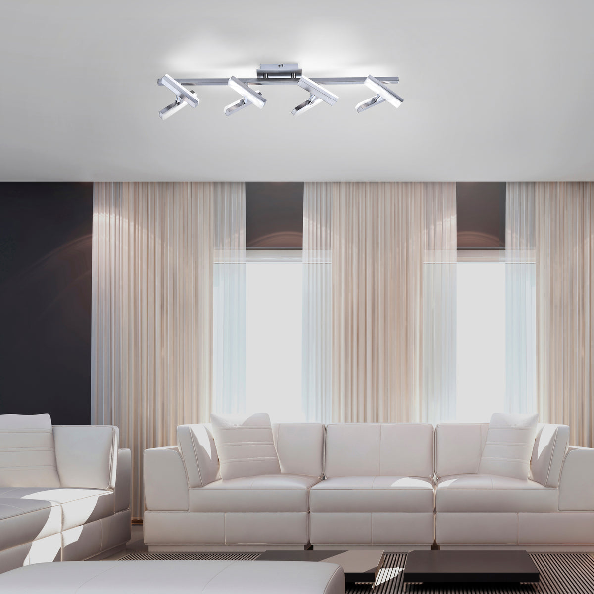 Mise en ambiance du plafonnier allumé au plafond d'un salon moderne avec canapé clair