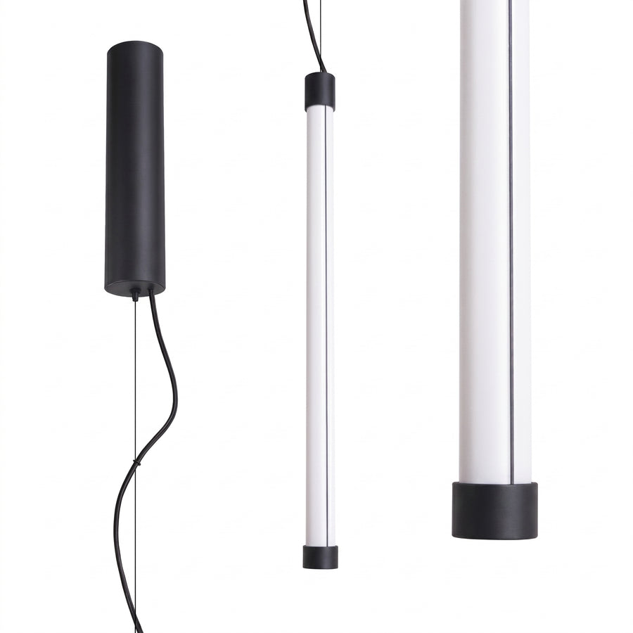 Version noire mate de la suspension cylindrique, silhouette fine et câble noir apparent