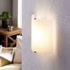 Applique murale LED Helmi en verre, transparent satiné, hauteur 21 cm