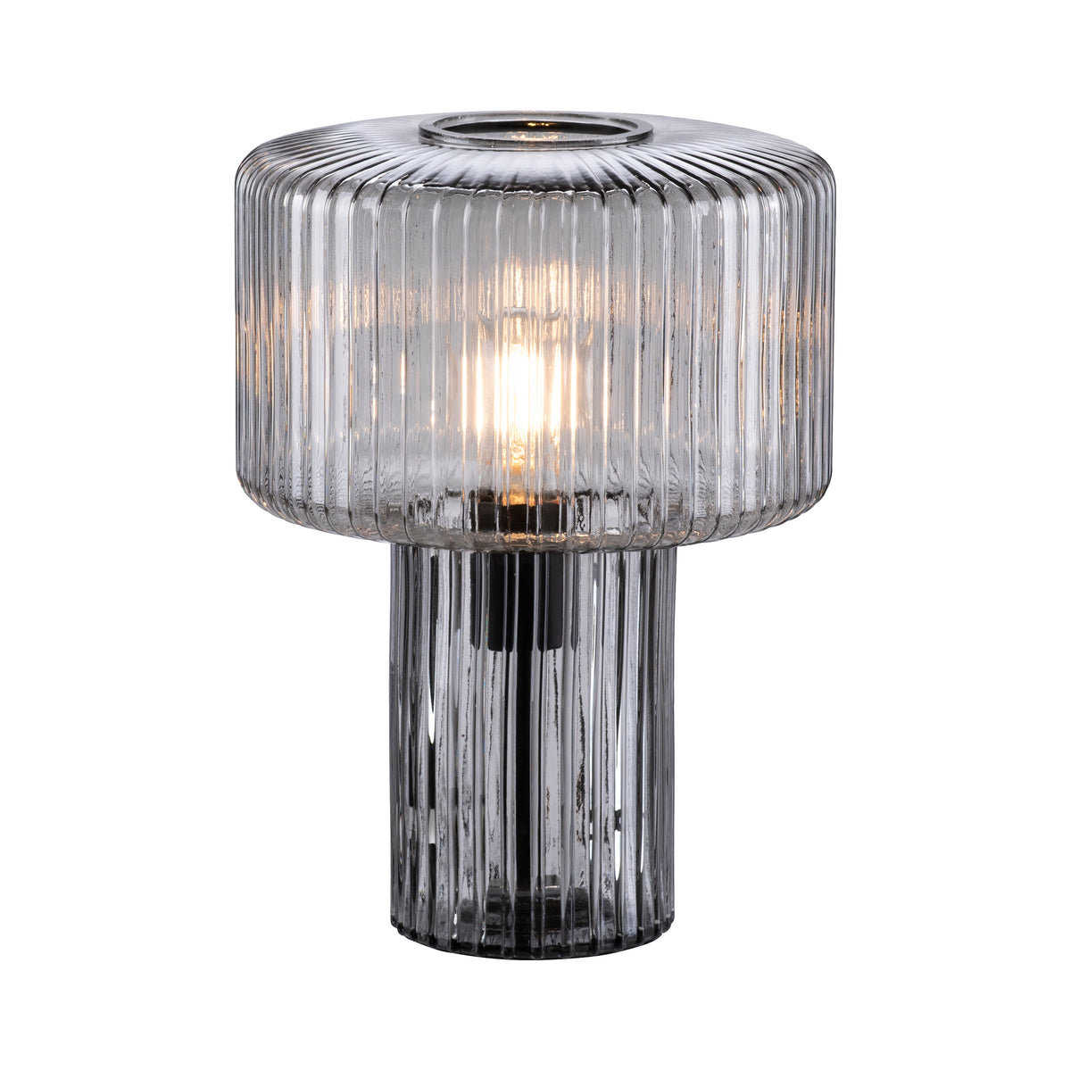 Vue détourée du luminaire en verre strié fumée, lumière chaude allumée sur fond blanc.
