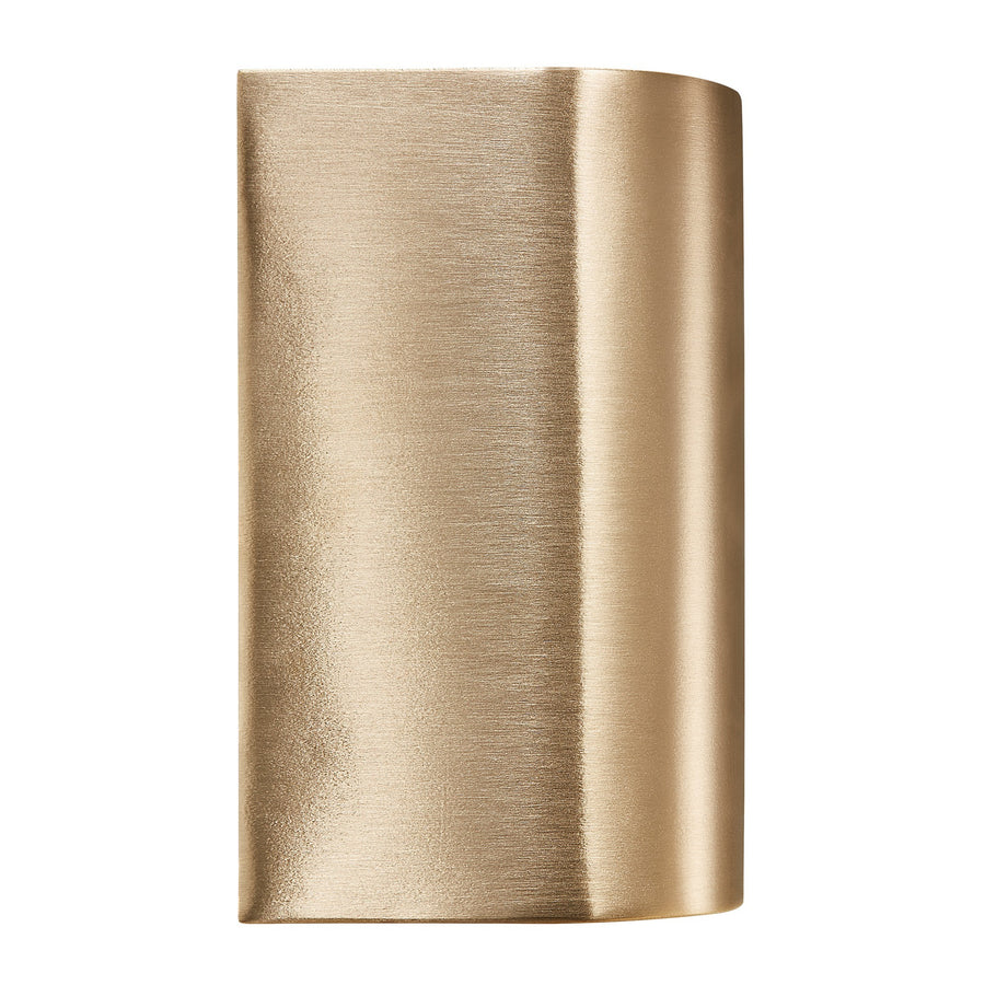 Détail de la finition laiton brossé doré sur la coque de l'applique