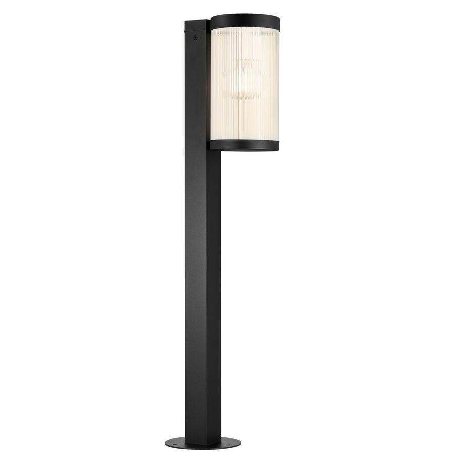 Borne extérieure noire avec diffuseur cylindrique en verre strié, vue de trois quarts