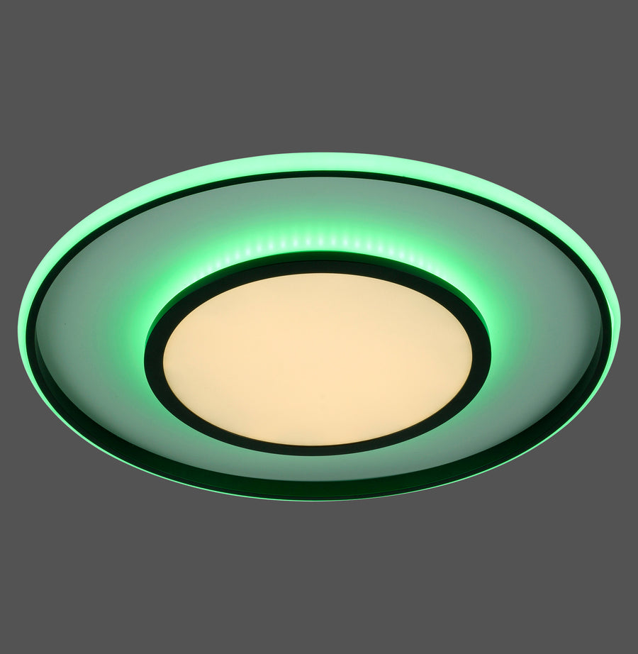 Vue de face du plafonnier rond noir, halo vert RGB allumé sur fond sombre
