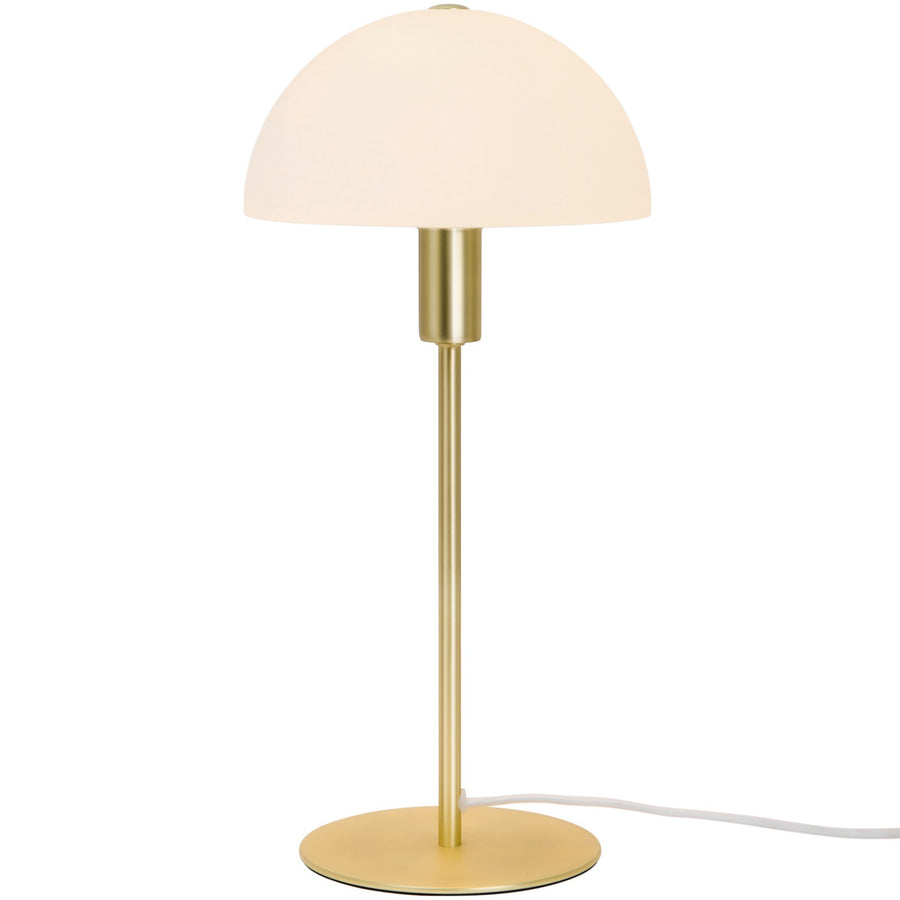 Lampe à poser de face avec abat-jour bombé en verre et pied en laiton.