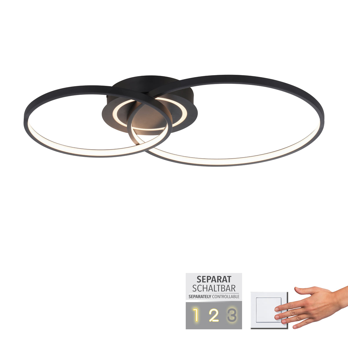 Luminaire à anneaux, texte séparément controllable et main actionnant un interrupteur.