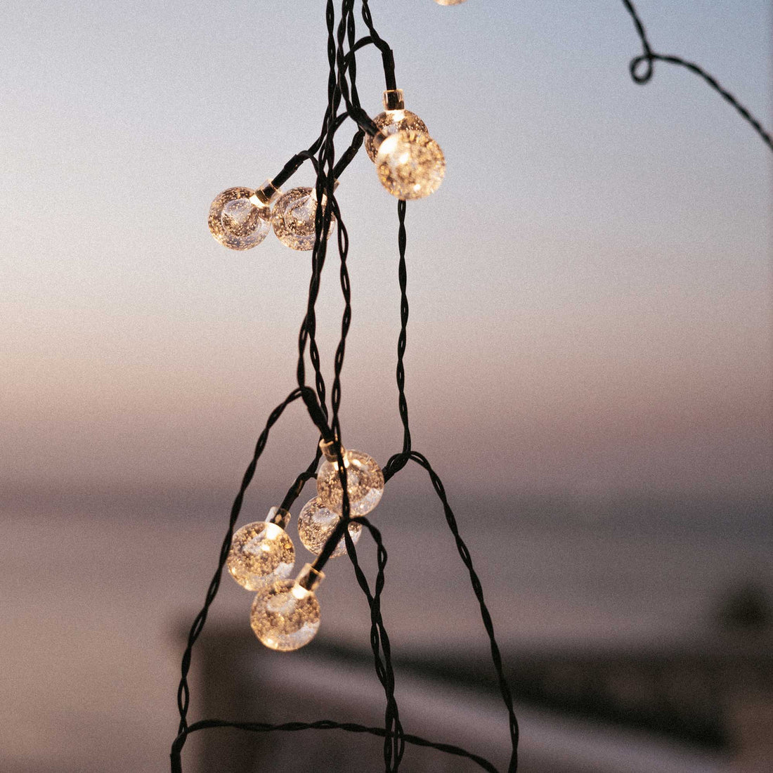 Griselda Glossy solar string lights, 266 cm