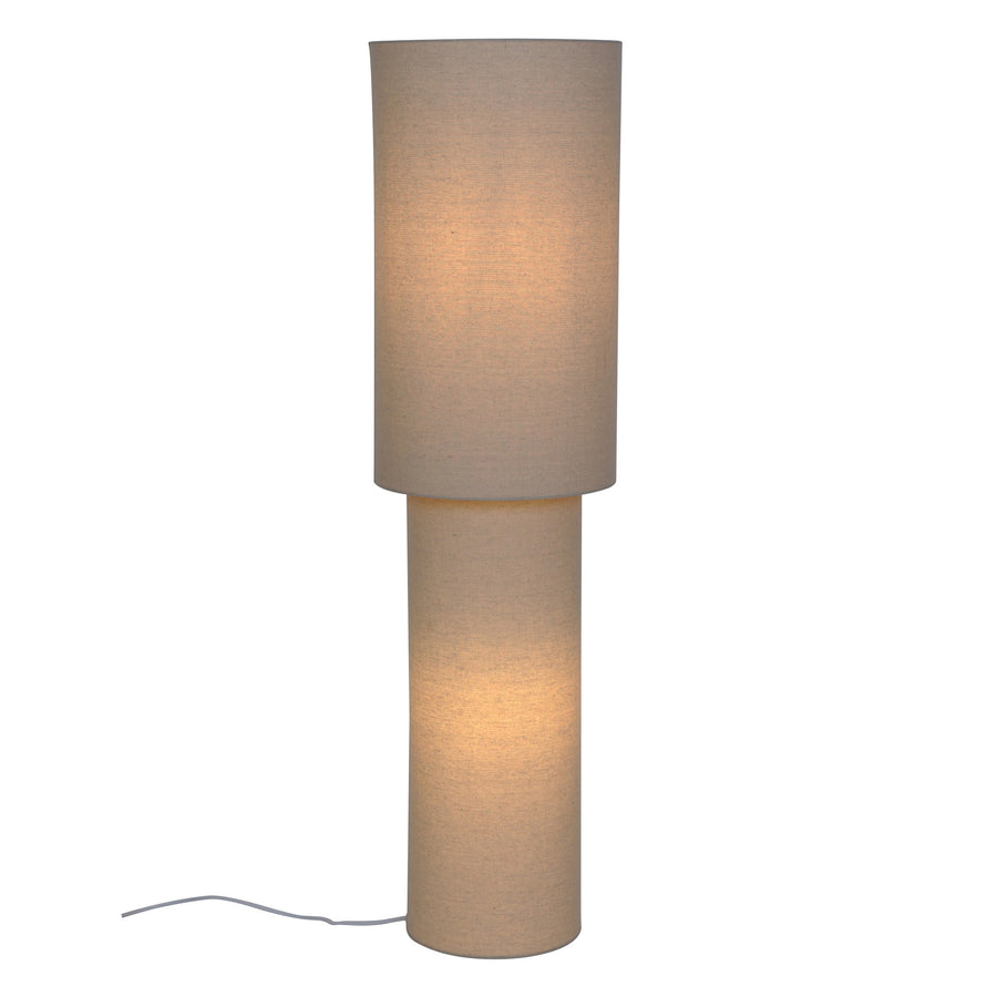 Lampadaire cylindrique beige allumé, vu de face sur fond blanc