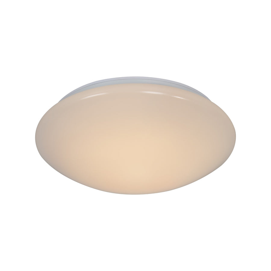 Plafonnier rond allumé de face, verre opale teinté chaud sur fond blanc