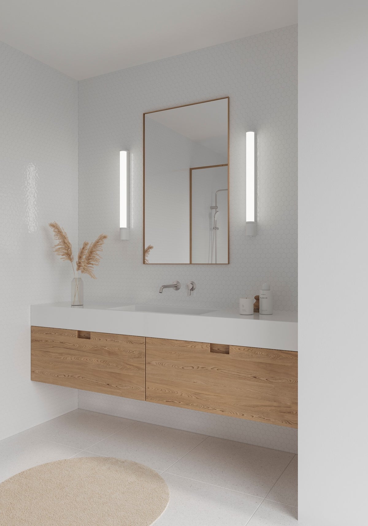 Mise en ambiance salle de bain, deux appliques de part et d'autre du miroir