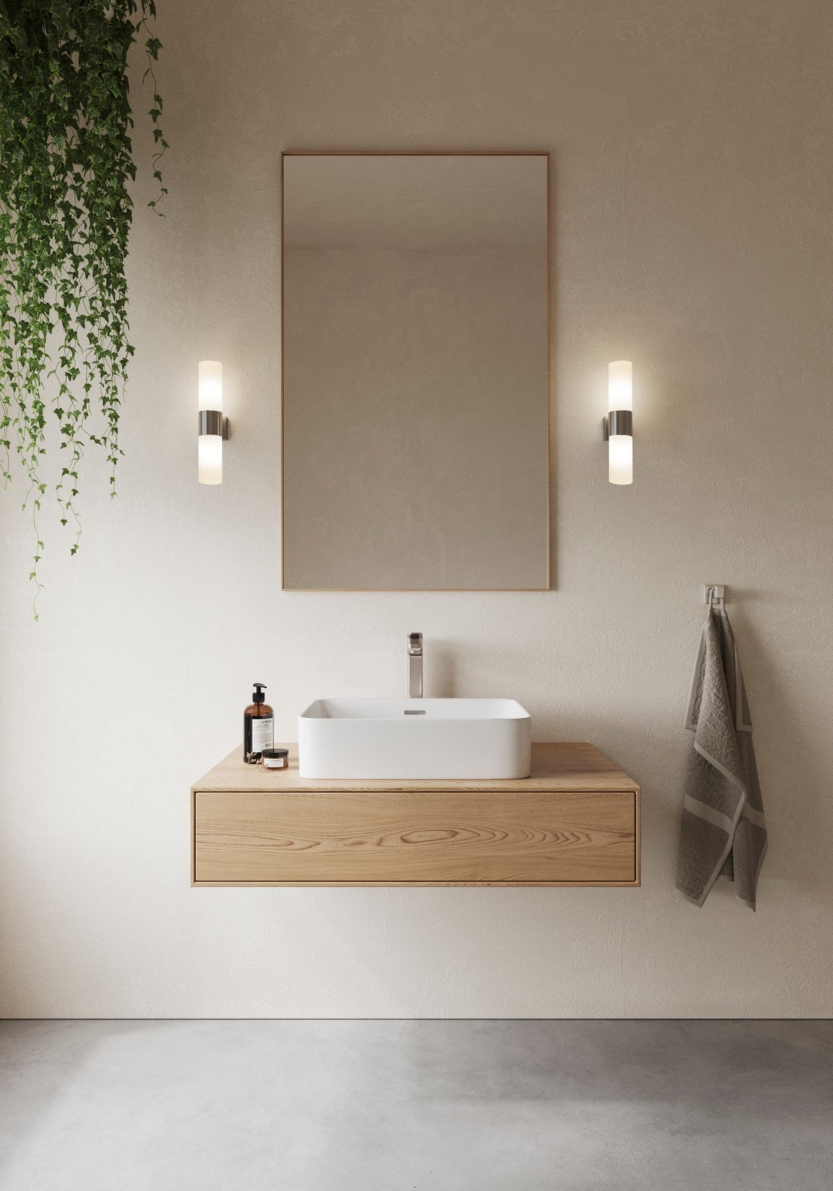 Mise en ambiance salle de bain, deux appliques de part et d'autre du miroir