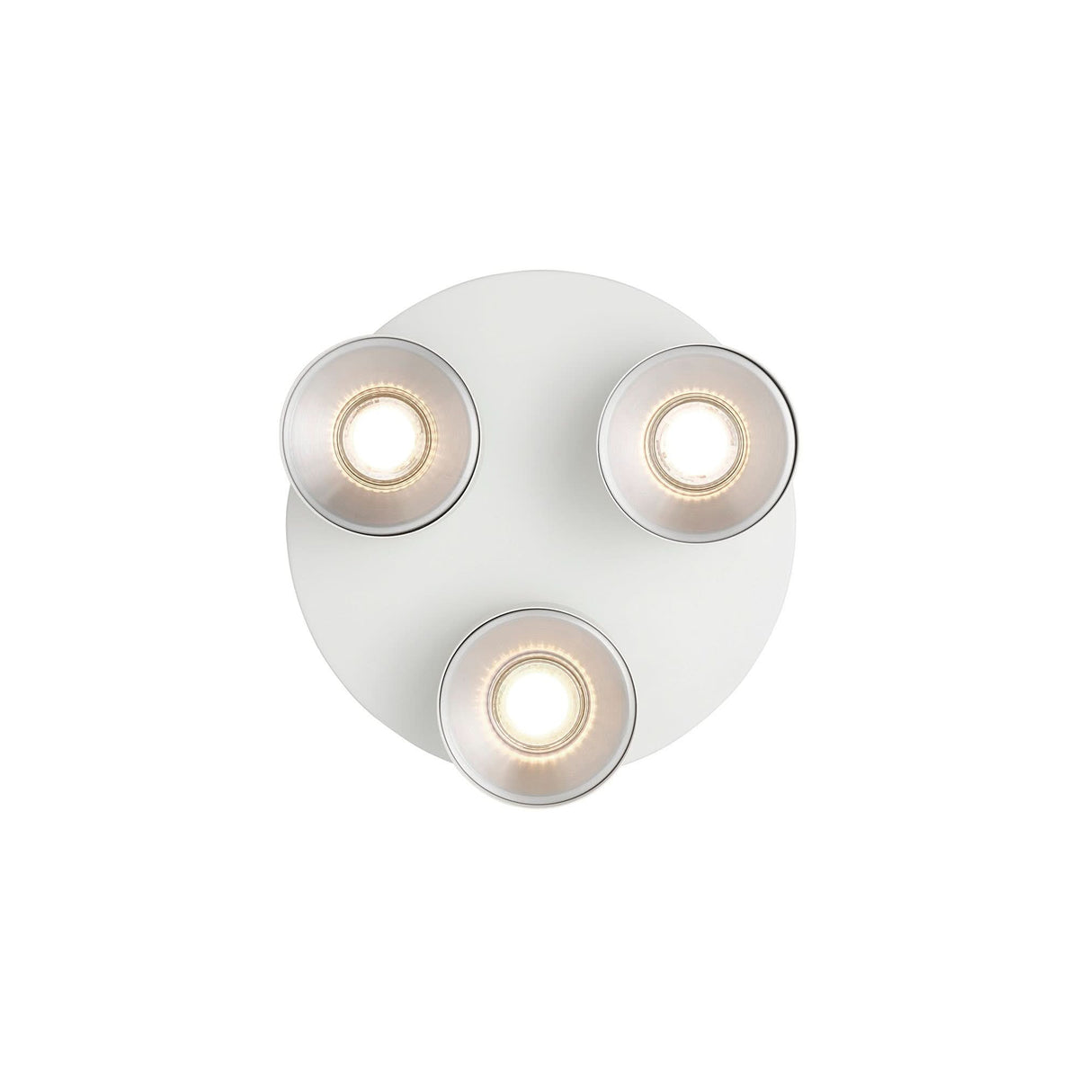 Vue de dessous du plafonnier blanc, trois spots allumés, socle rond