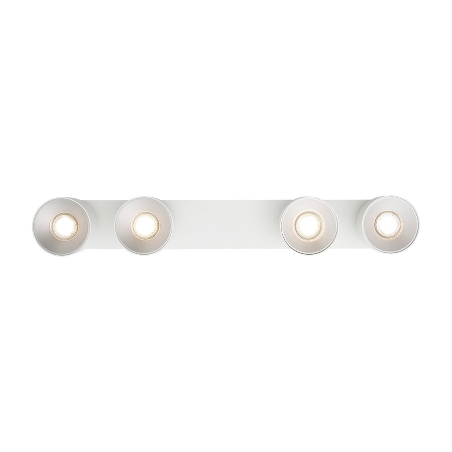 Vue de face des quatre spots blancs alignés sur la barre rectangulaire