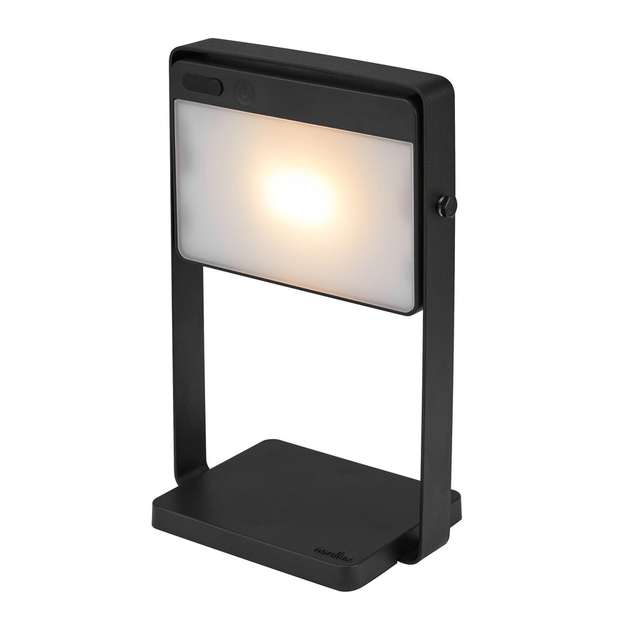 Lampe nomade noire de face, diffuseur rectangulaire allumé et support en U
