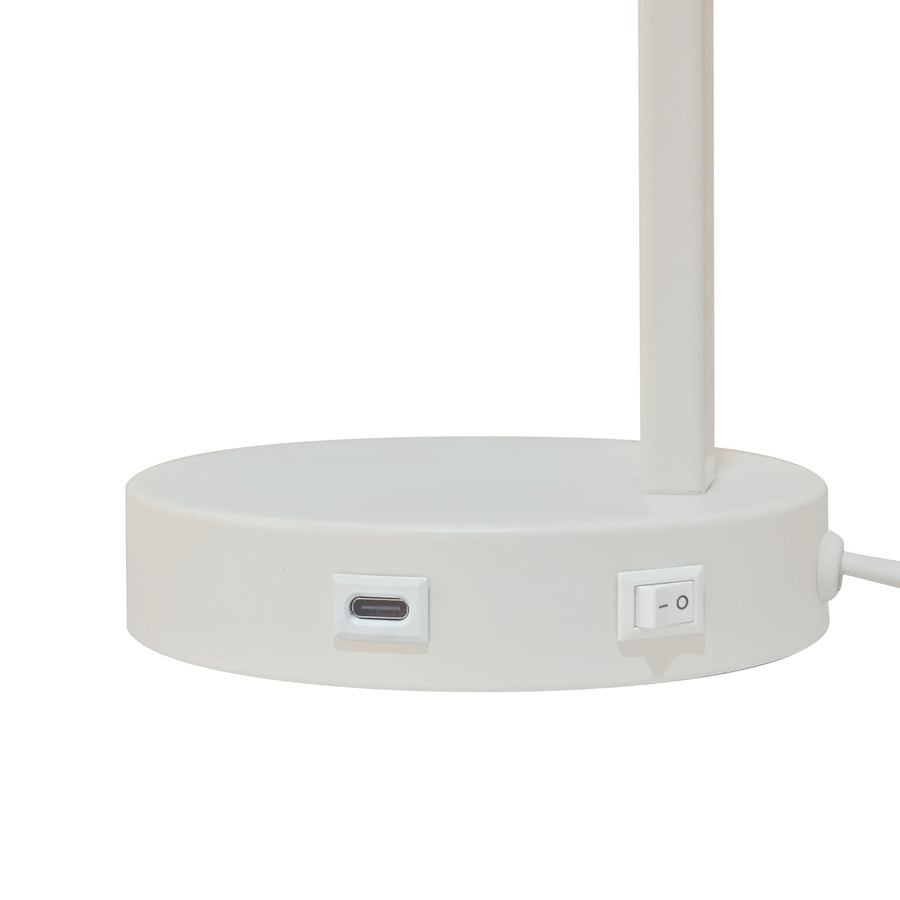 Détail du socle blanc avec prise USB-C et interrupteur d'alimentation.