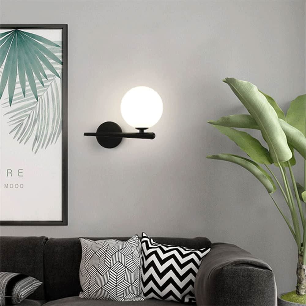 Black brass wall lamp | Luminous Sphere