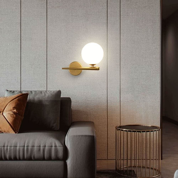 Black brass wall lamp | Luminous Sphere