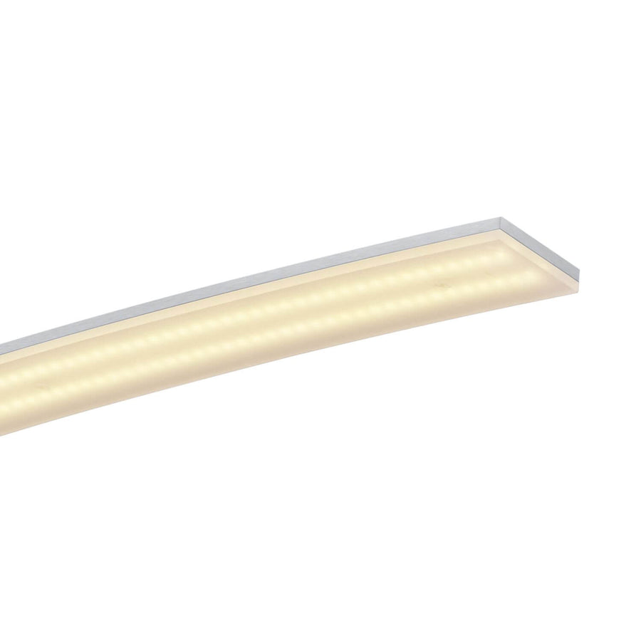 Gros plan du diffuseur allumé en lumière chaude, avec bordure aluminium et LED visibles.