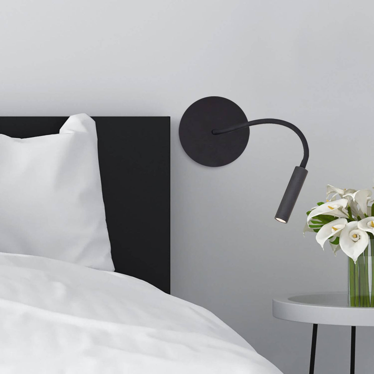 Mise en ambiance de l'applique de chevet installée près d'un lit