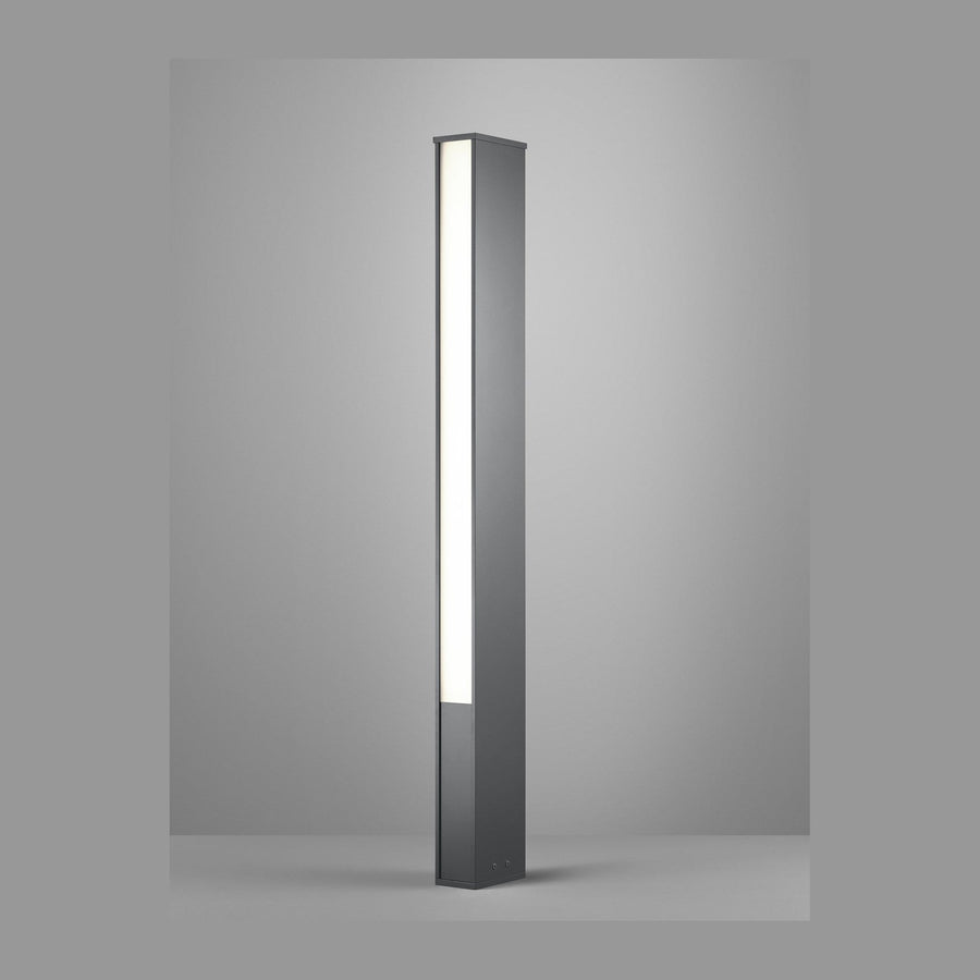Borne lumineuse anthracite dressée, face avant éclairée sur fond gris neutre