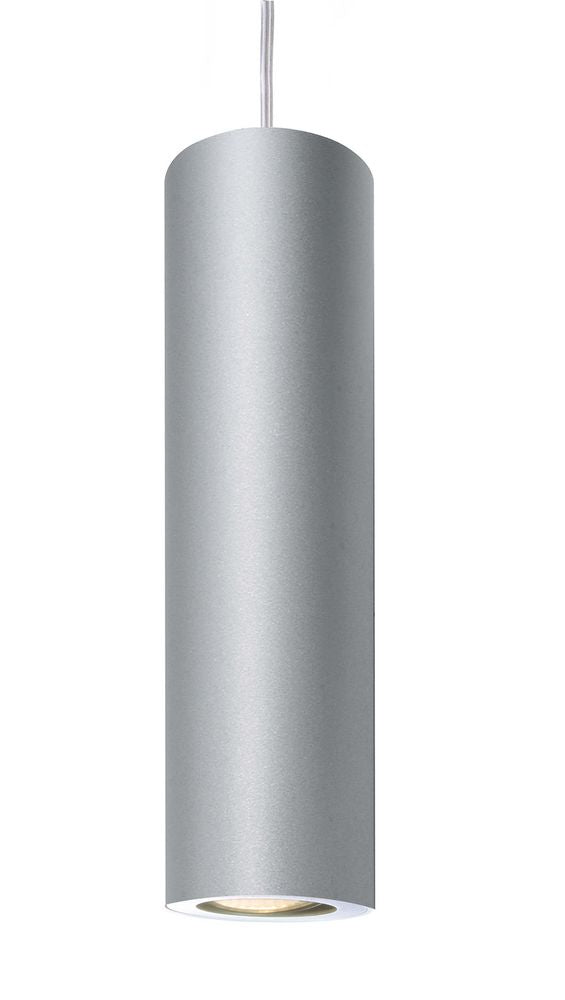 Gros plan sur le cylindre en aluminium et l’ouverture lumineuse à sa base.