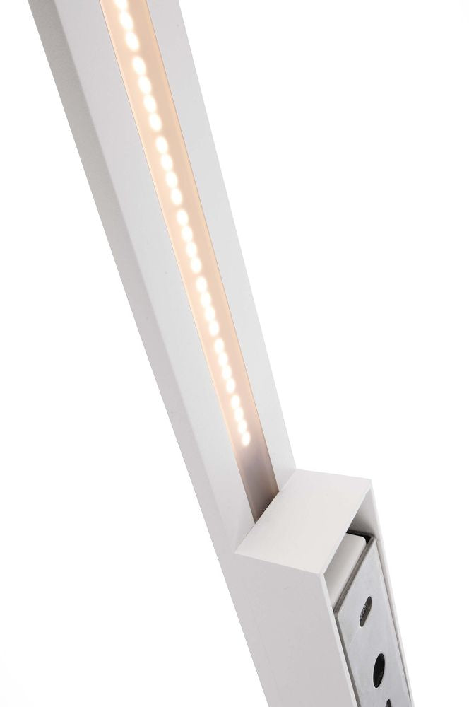 Détail rapproché du bandeau LED allumé et du support de fixation mural