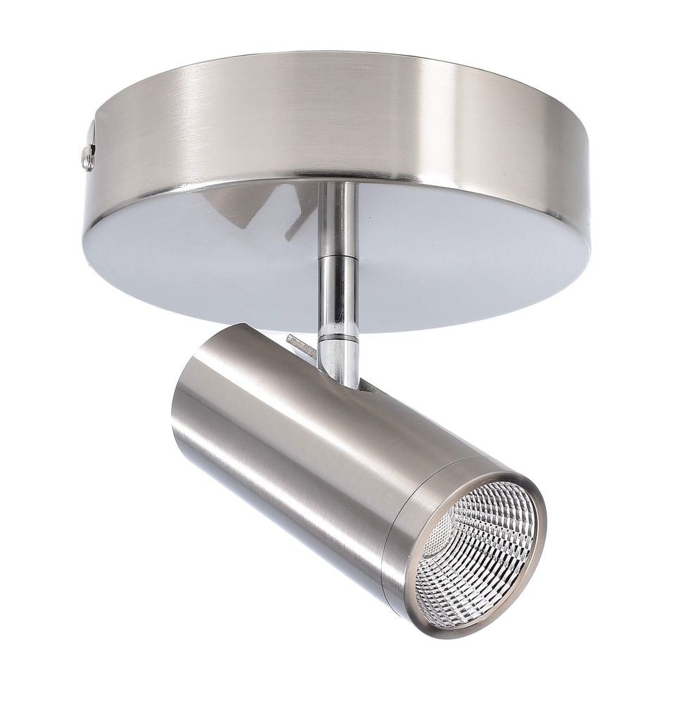 Vue rapprochée du spot orientable et de sa base ronde en métal brossé.