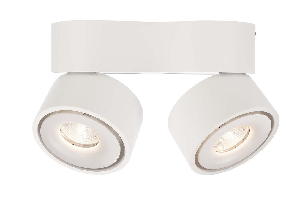 Vue de dessous du spot double, têtes cylindriques orientées vers le bas.