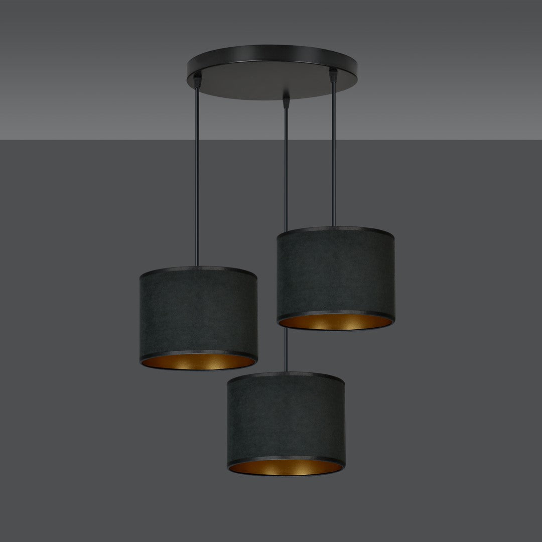 Trois suspensions cylindriques noires sur fond gris anthracite, éclairage éteint