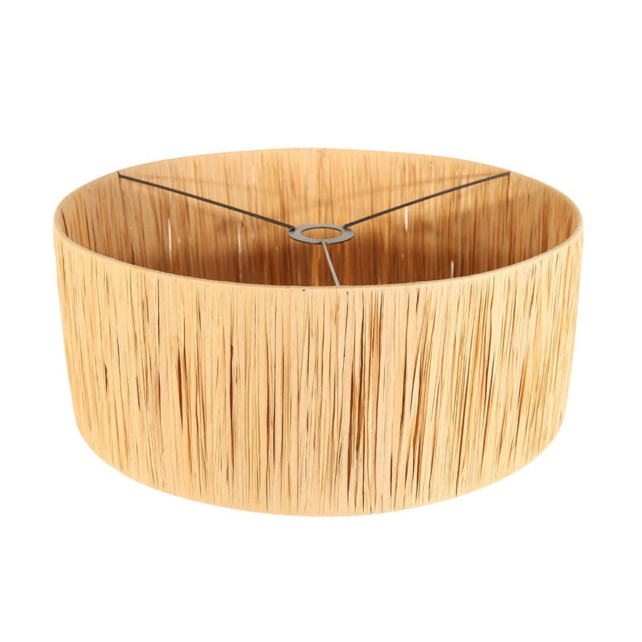 Abat-jour cylindrique en fibres naturelles tressées avec armature métallique apparente à l'intérieur.