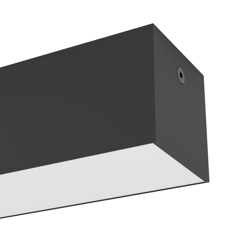 Détail du boîtier noir et du passe-câble circulaire sur la face latérale