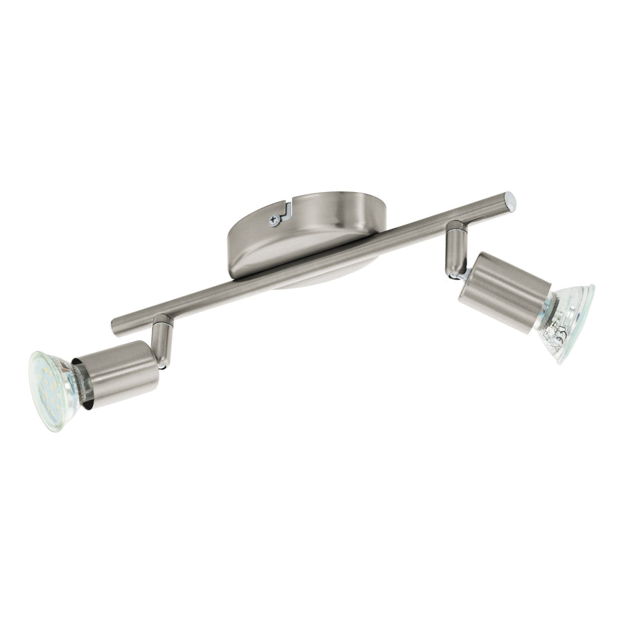 Vue plongeante du luminaire posé sur un support ovale, projecteurs orientés vers le bas.