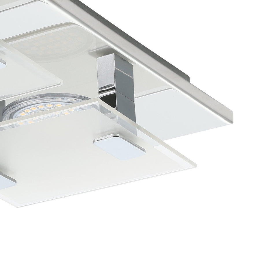 Détail de finition : module LED sous plaque de verre et support chromé