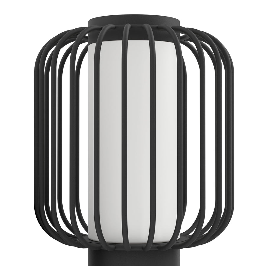 Gros plan sur la cage métallique noire entourant le diffuseur blanc dépoli