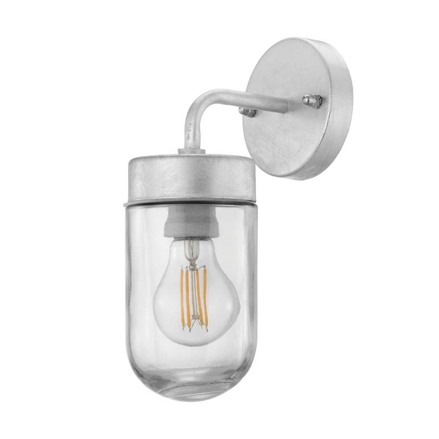 Applique murale galvanisée vue de face sur fond blanc, verre cylindrique transparent