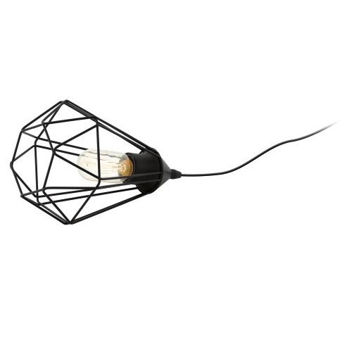 Lampe noire couchée sur le côté, cage métallique et câble d'alimentation visibles
