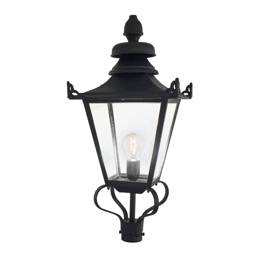 Vue de face du luminaire à poser sur poteau, verre clair et ampoule allumée
