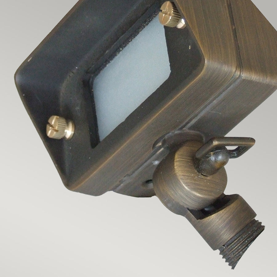 Détail du support articulé et de la base filetée du projecteur extérieur en bronze