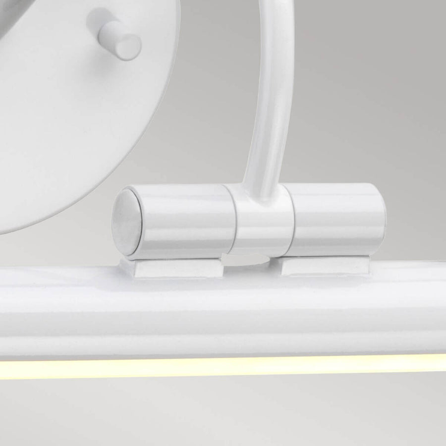 Détail du raccord cylindrique reliant le bras au tube lumineux horizontal