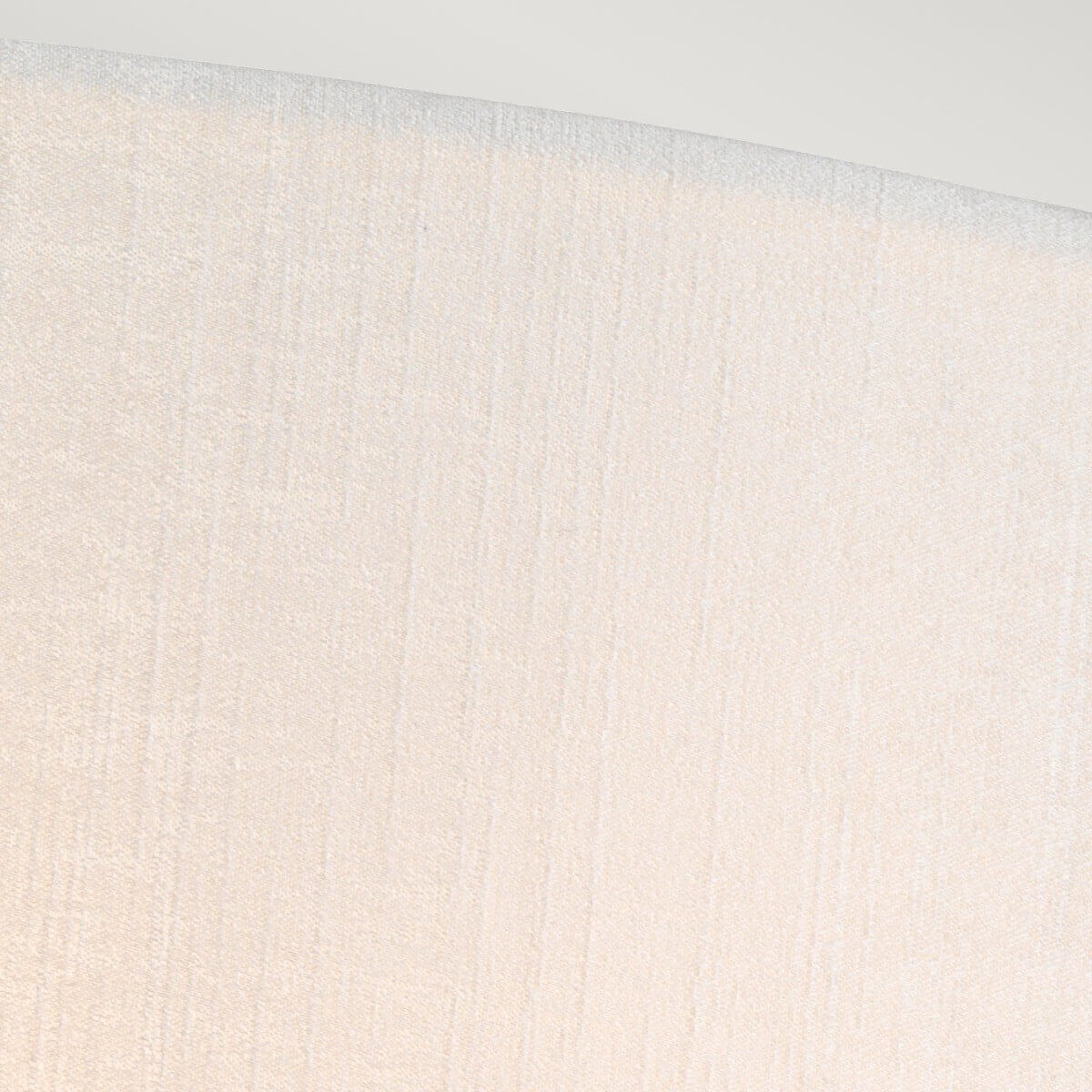 Gros plan sur la texture tissée et le grain de l'abat-jour crème