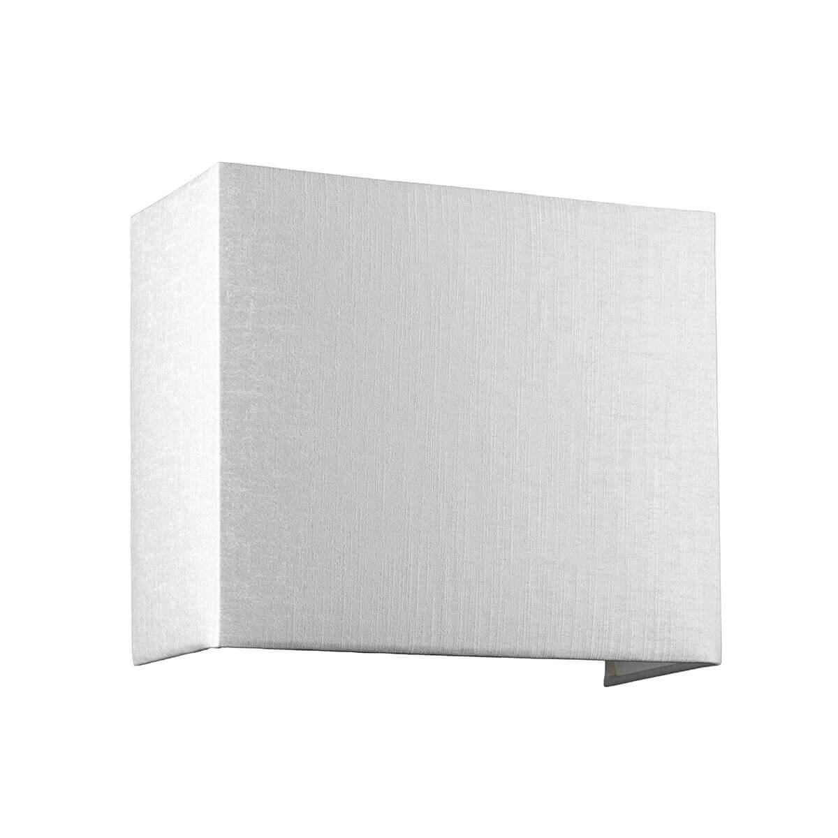 Vue de face du luminaire éteint, abat-jour textile crème et base métallique dorée