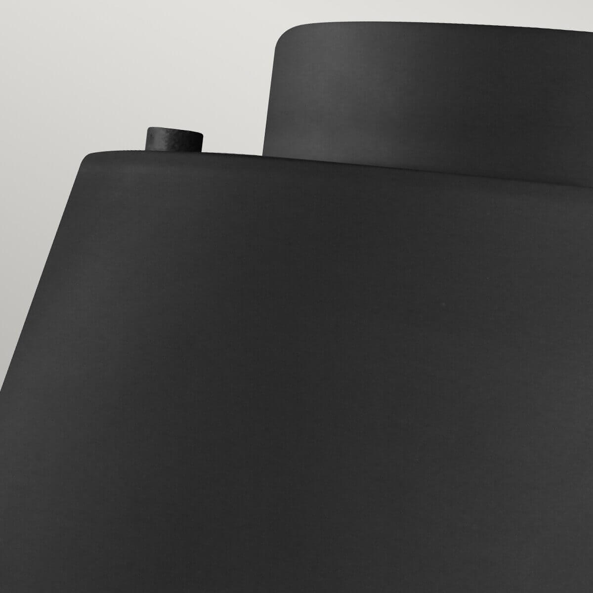 Détail du bord supérieur avec petit cabochon cylindrique sur l'abat-jour noir mat